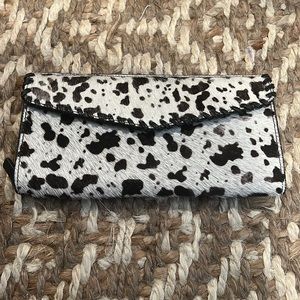 Cowhide whipstitch wallet. Excellent condition.